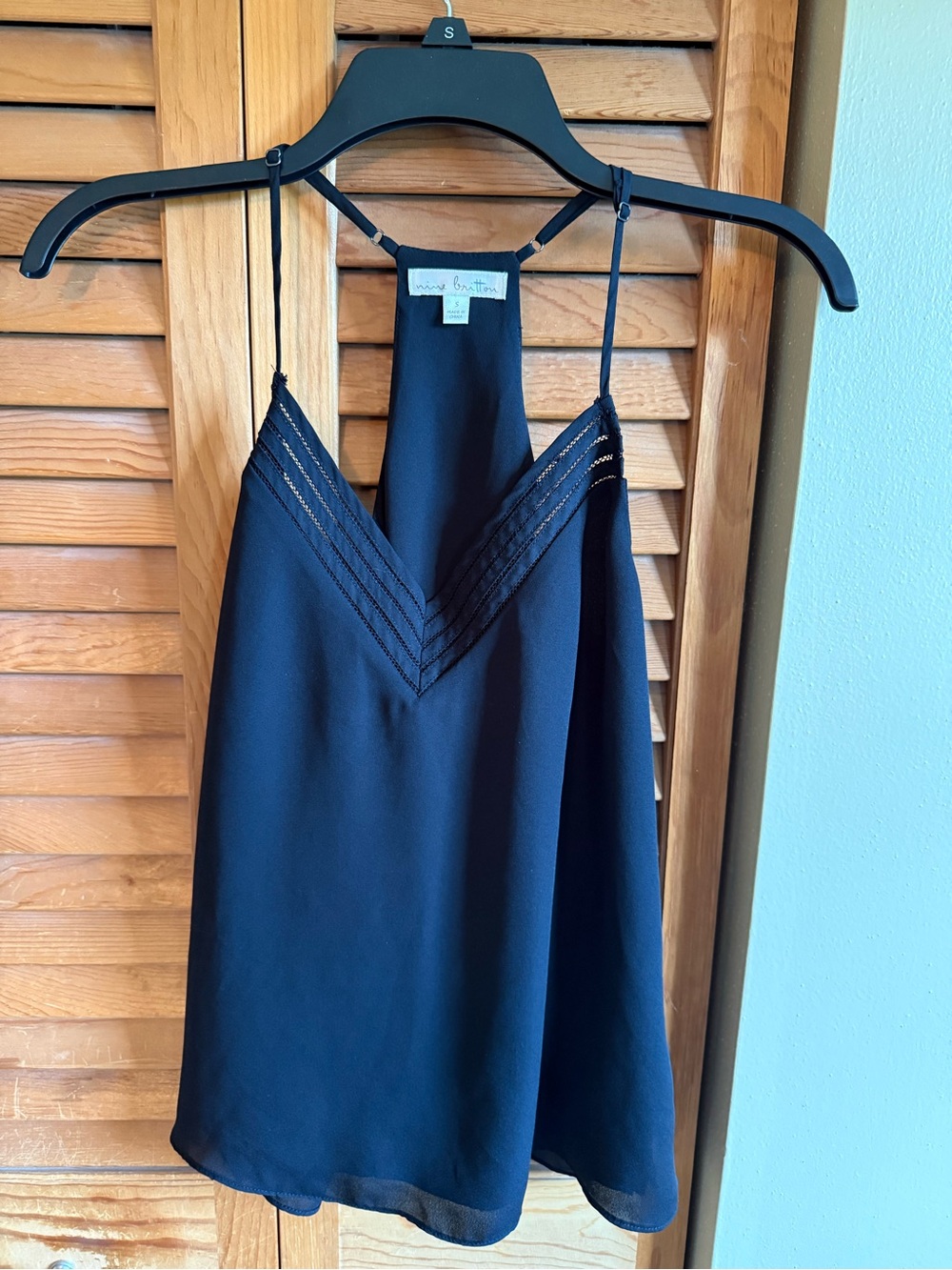 nine britton Black V-Neck top